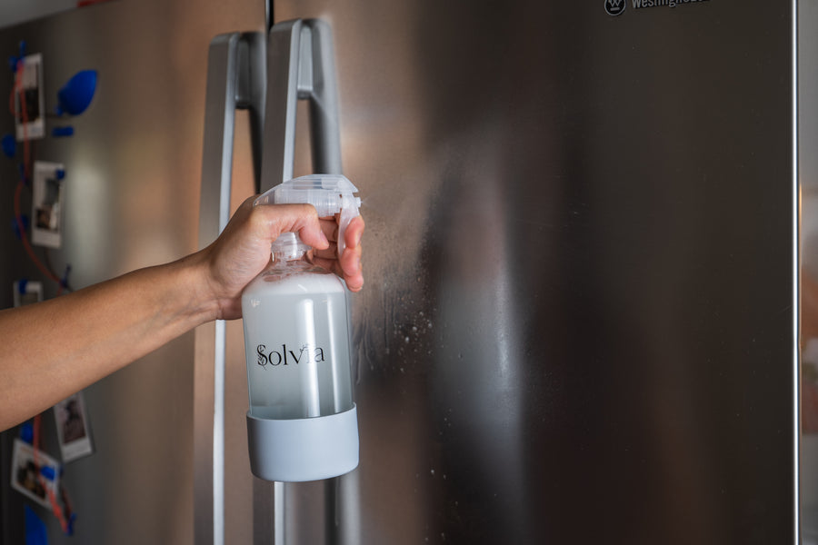 Spraying with the Solvia glass bottle clearly visible